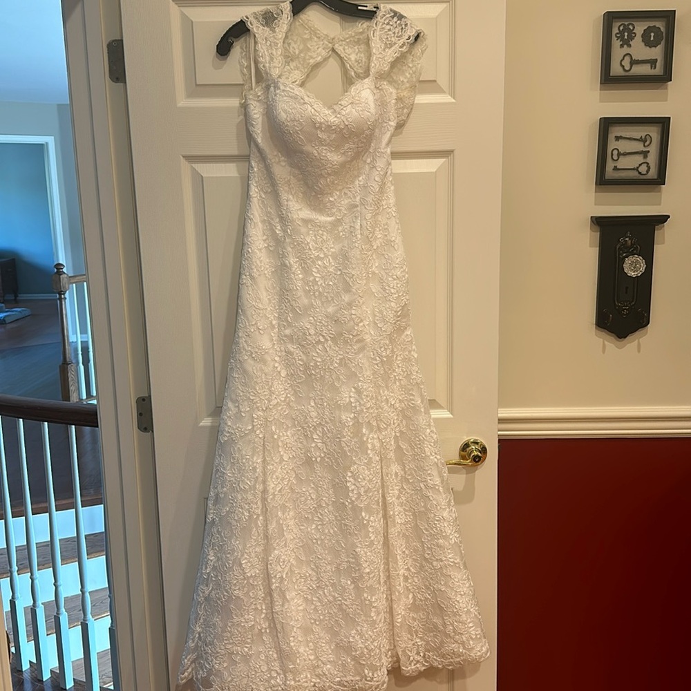 Symphony Venus Wedding dress with cap sleeves and opening in the back